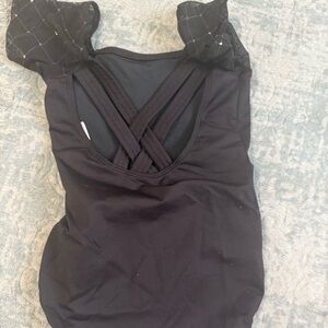 Black Sleeveless Top with Sheer Accents